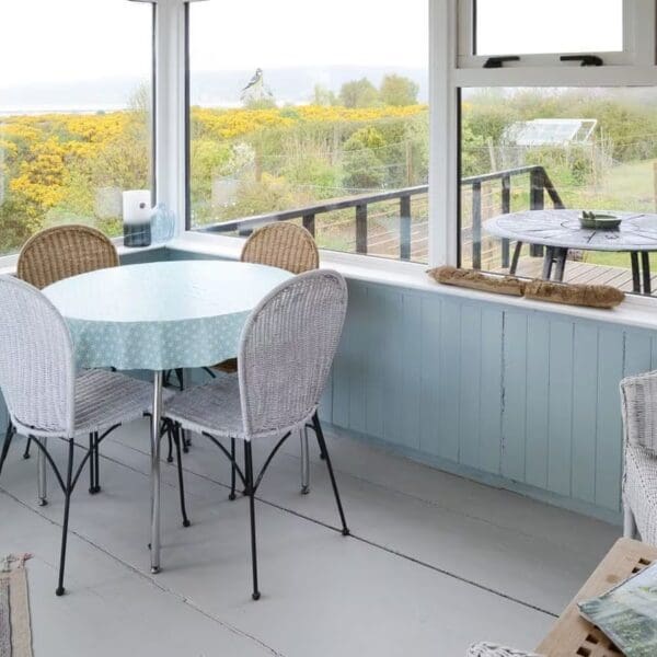 Dining table and chairs in sunlounge, Wester Lonemore, Dornoch