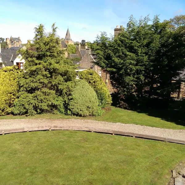 Garden with view to cathedral, East Dune holiday apartment, Dornoch