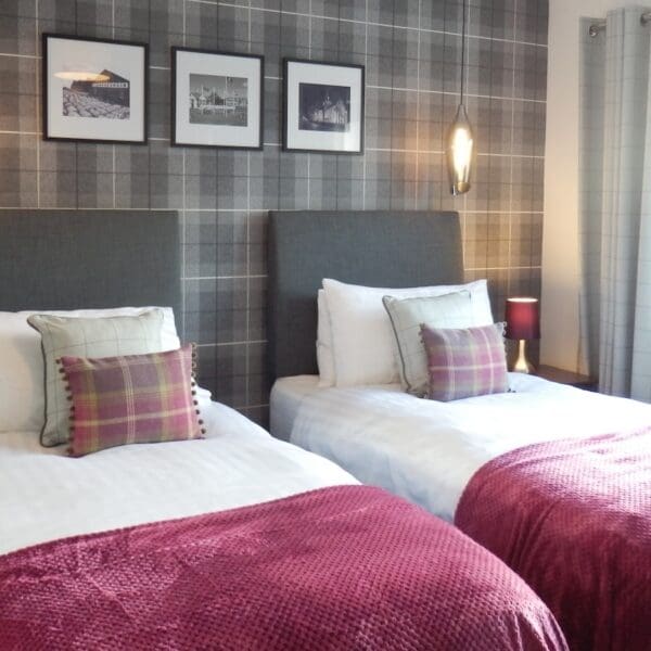 Zip link beds made up as twin in master bedroom, Glen Brodie self catering, Dornoch
