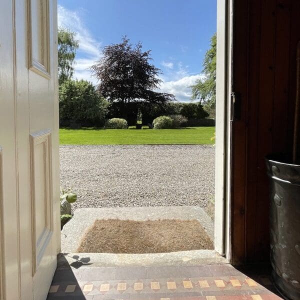View from front door out to garden lawn at Balloan House, Dornoch