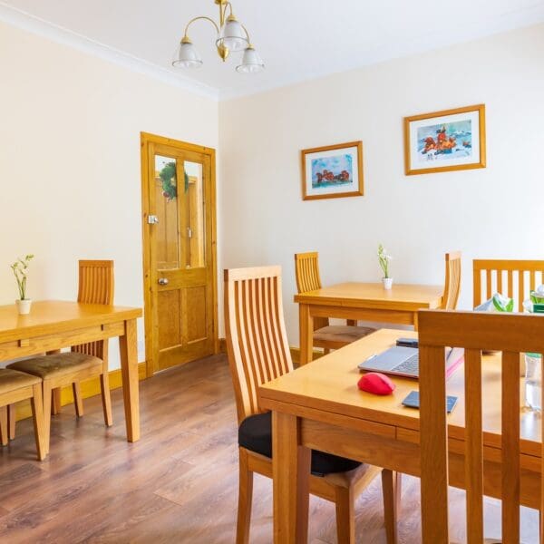 Dining room with pine tables and chairs, Strathview Lodge B&B Dornoch