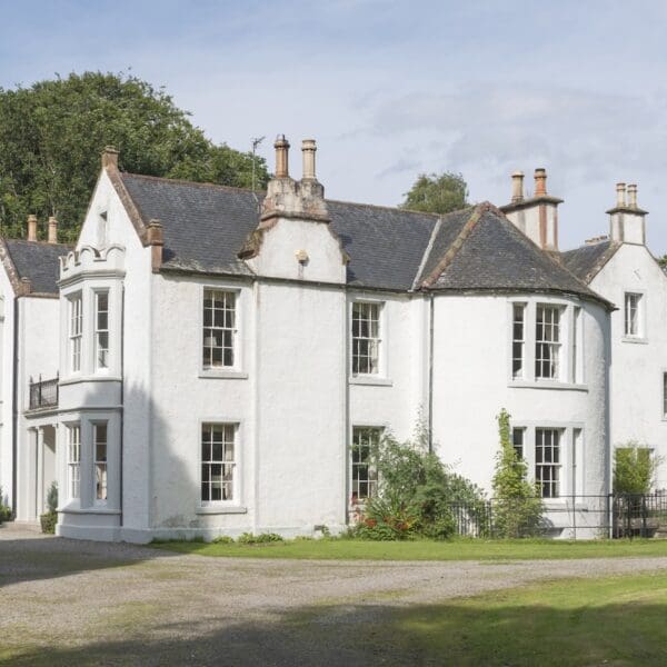 Exterior of white Georgian style manor house