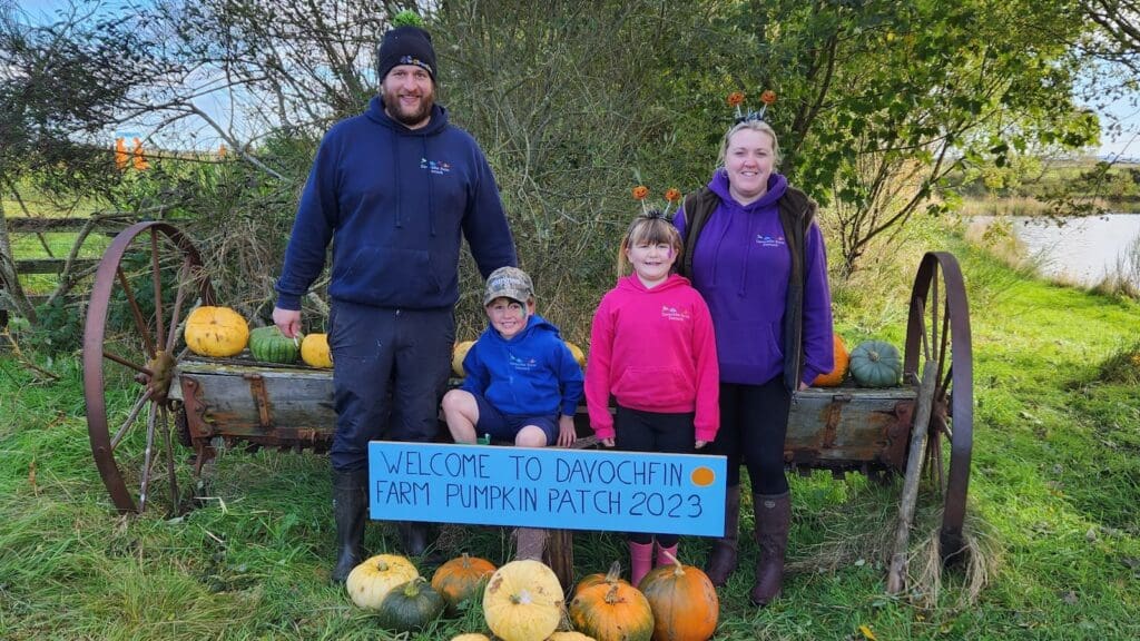 Family at Davochfin Farm pumpkin patch 1600 x 900