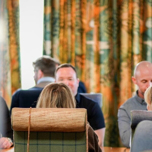 People sitting in dining room of Mara restaurant, Links House Hotel