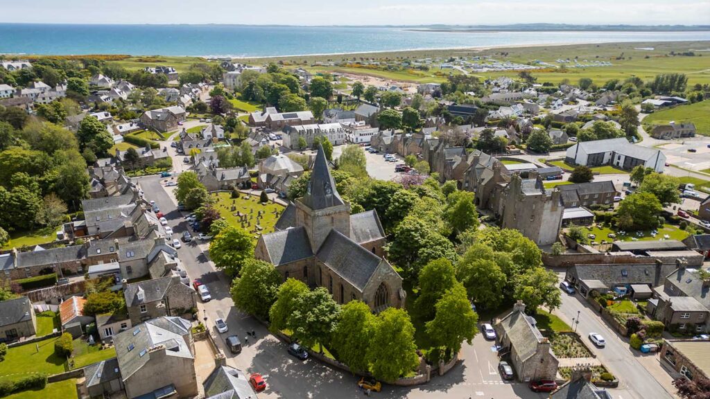 Aerial photo over town of Dornoch looking east towards sea 16x9